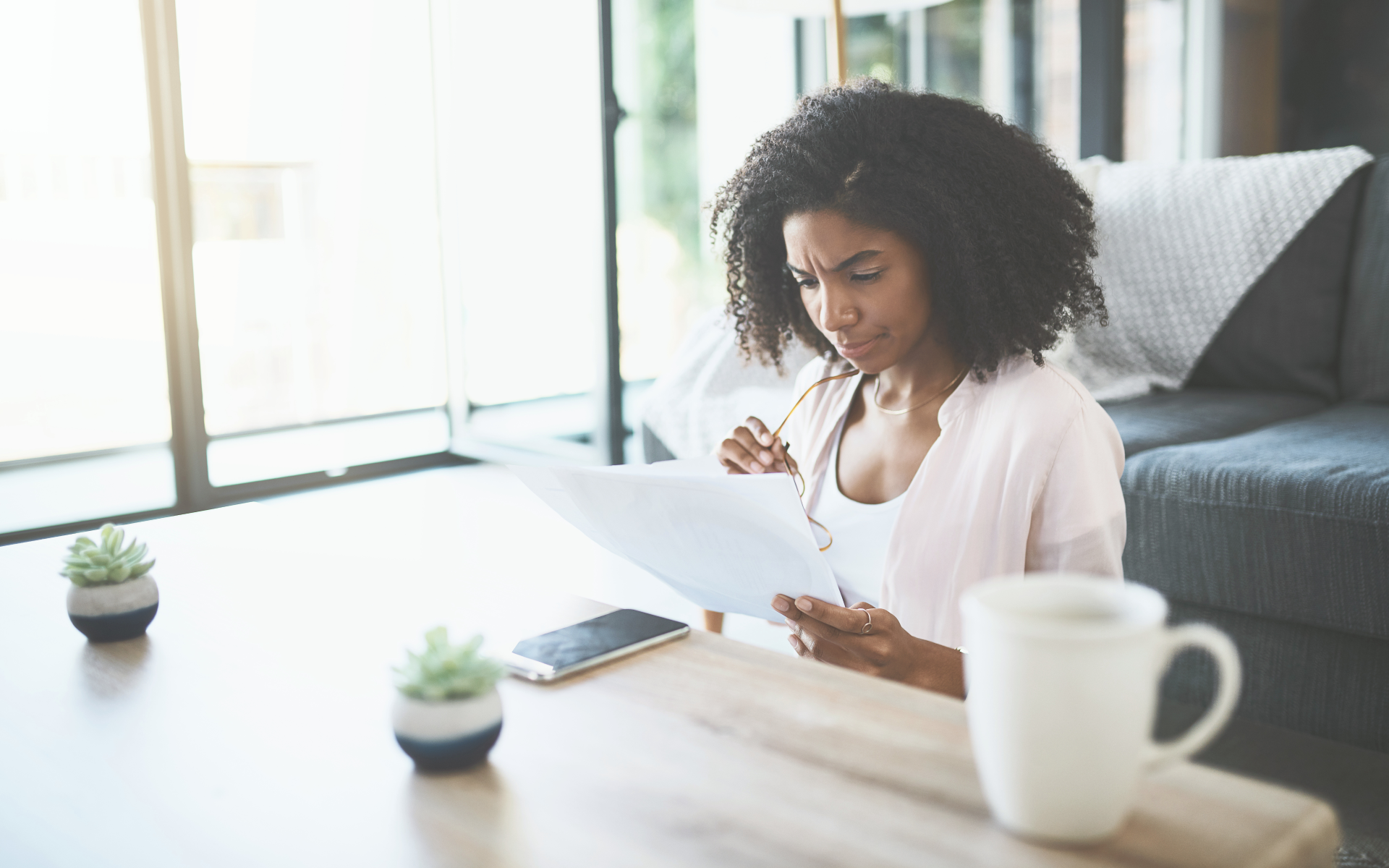 A young public worker evaluates the rising cost of living