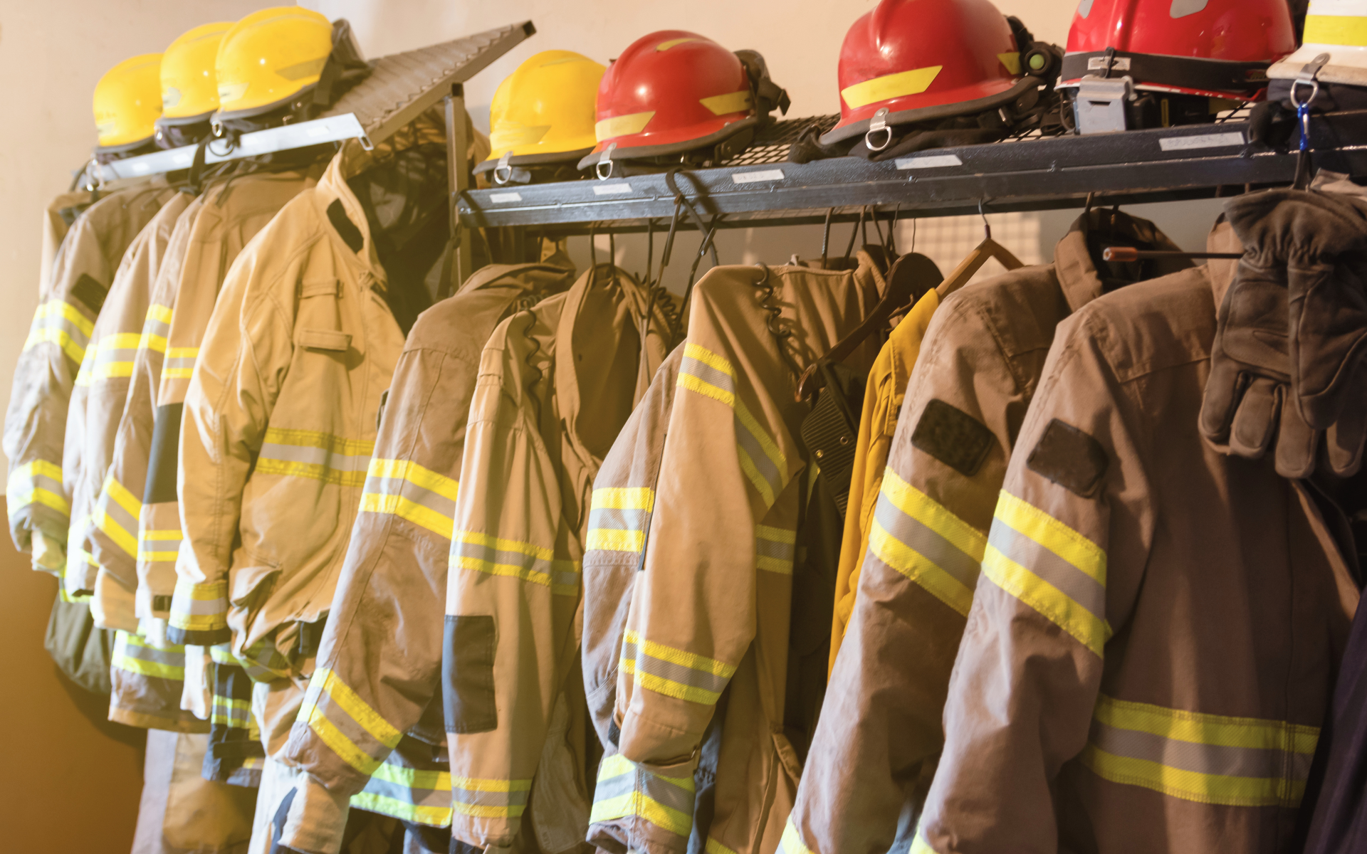 Firefighter jackets and gear at the fire station