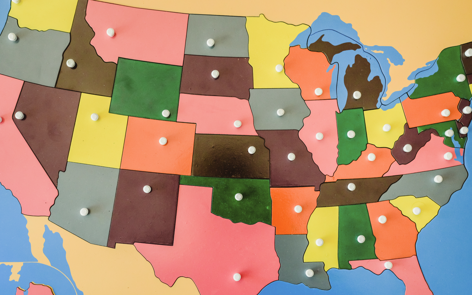 A wooden puzzle map of the United States