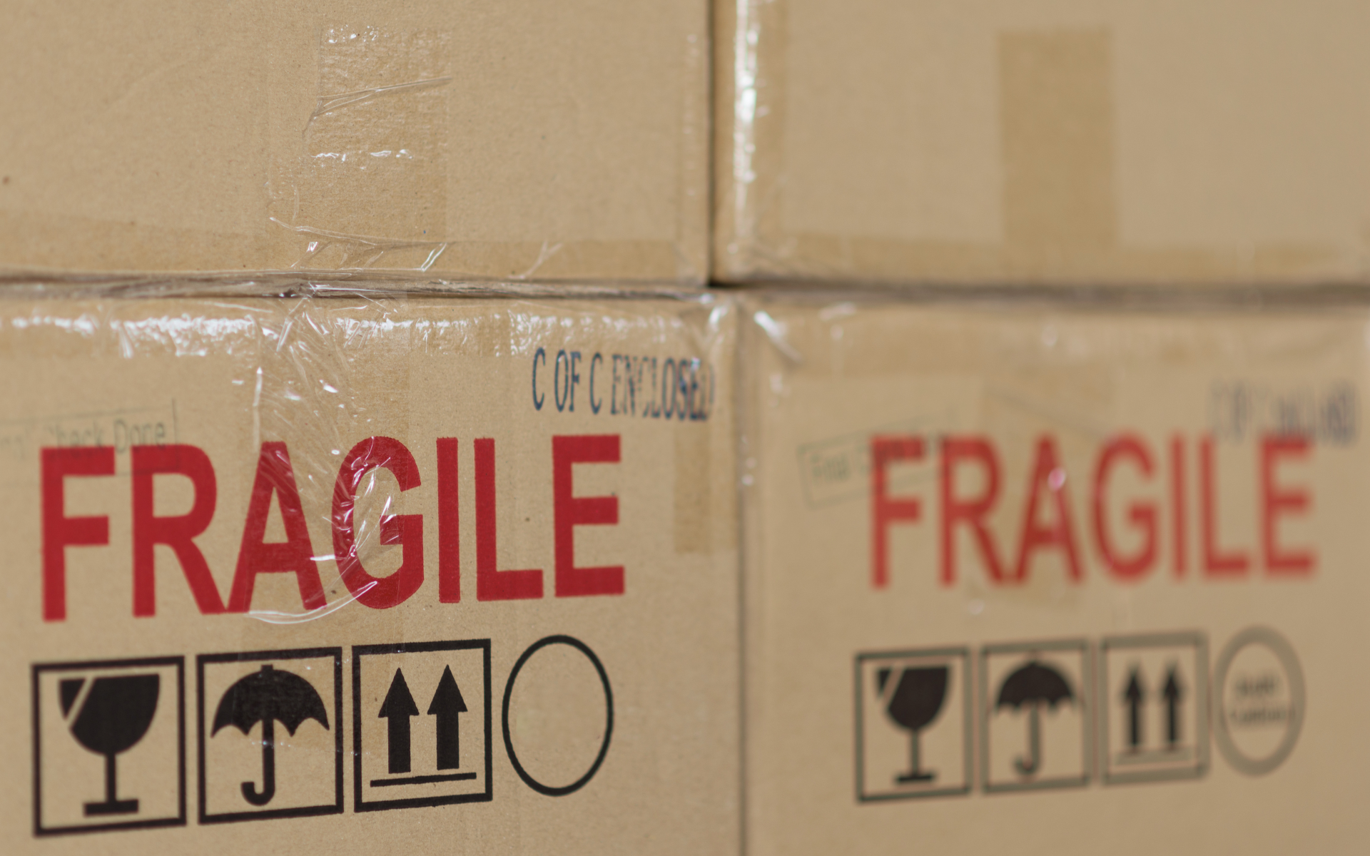 Brown cardboard boxes labeled "fragile"