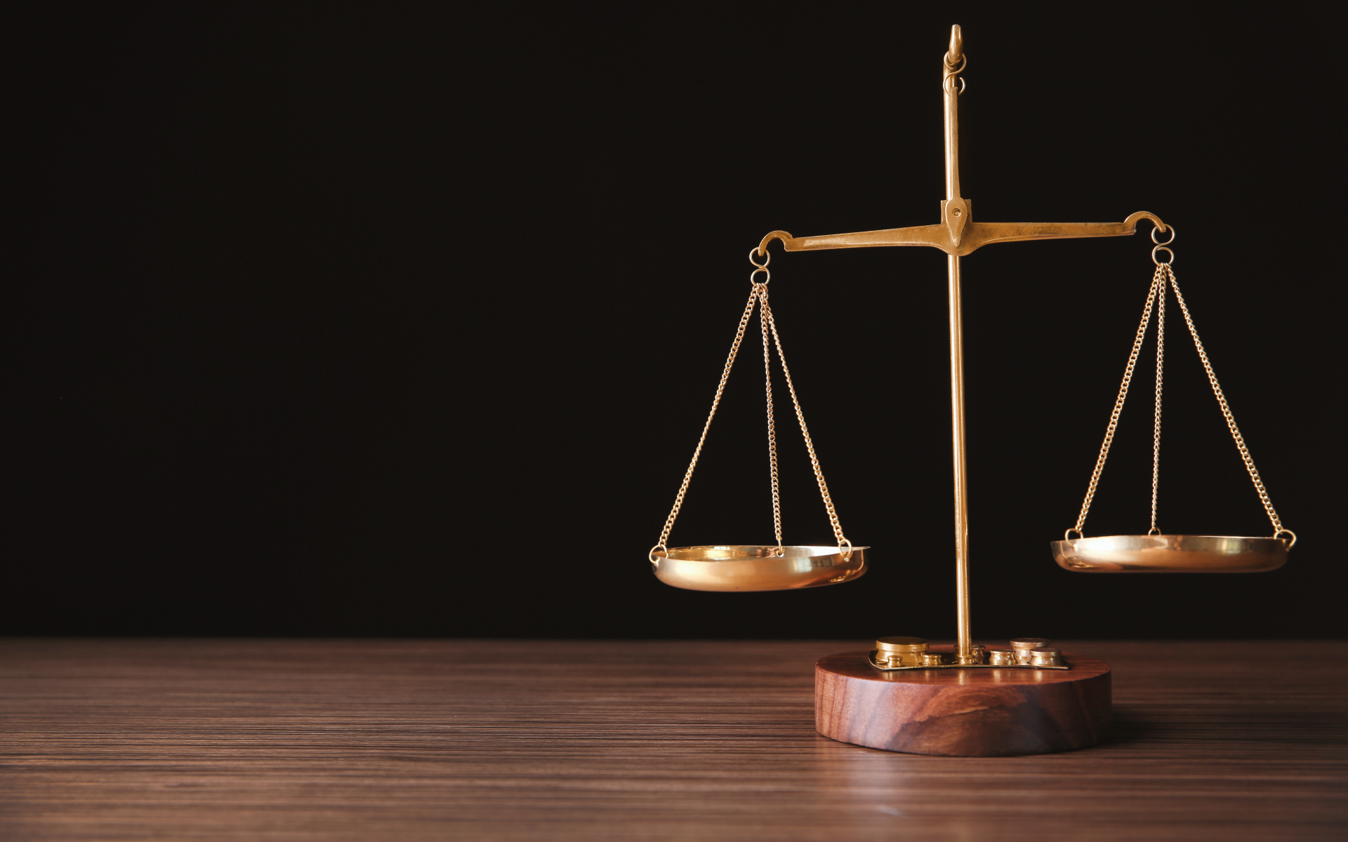 A balanced scale on a wooden table